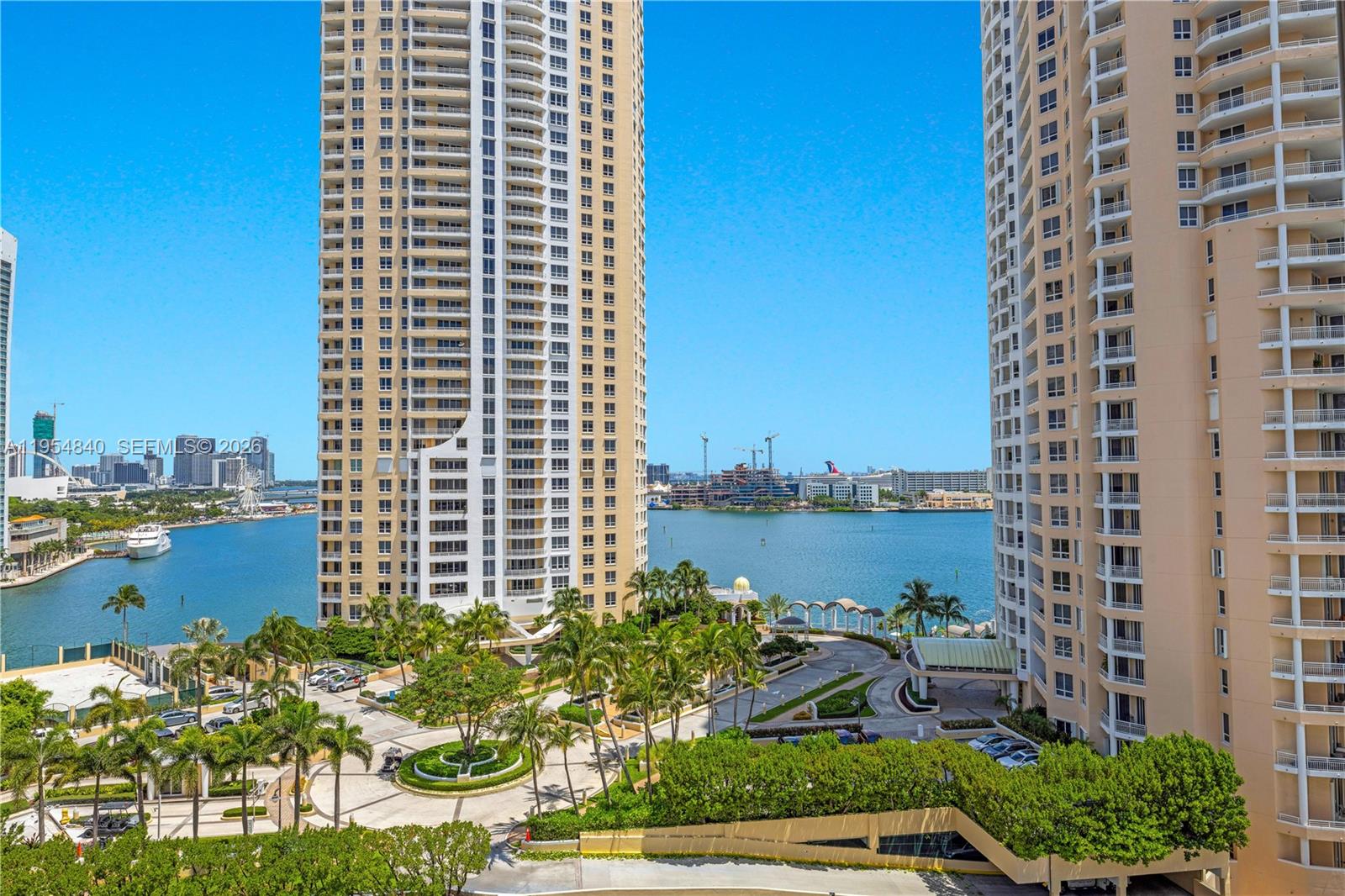 540 Brickell Key Drive, Unit 1514 Miami, FL 33131 - Photo 6 of 22 a view of a lake with a city skyline