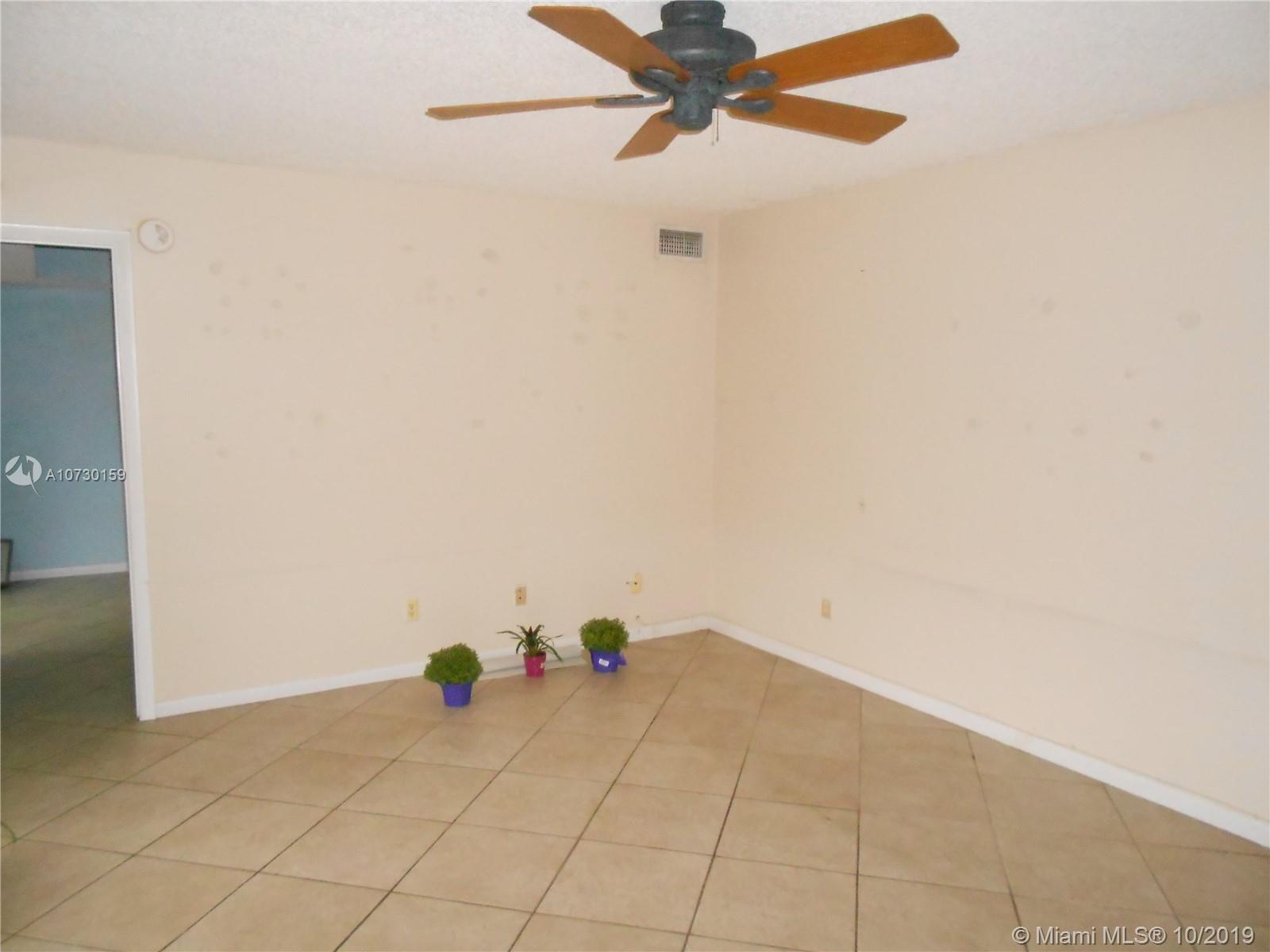 8387 Boca Rio Drive, Unit 8387 Boca Raton, FL 33433 - Photo 14 of 49 Living Room