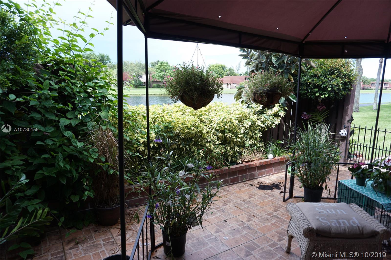 8387 Boca Rio Drive, Unit 8387 Boca Raton, FL 33433 - Photo 3 of 49 Front patio