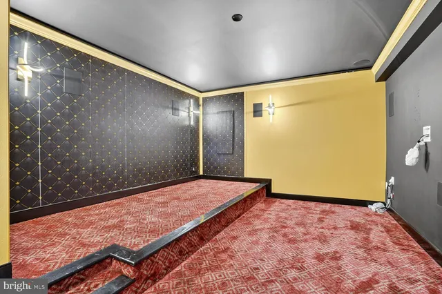 a view of a house with a yard and hanging chair