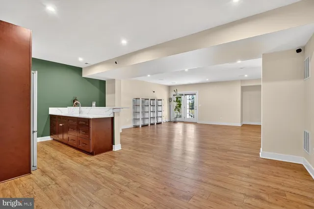 a view of a park with large trees