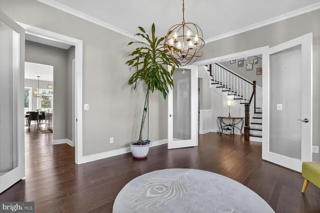 a kitchen with stainless steel appliances sink microwave and cabinets
