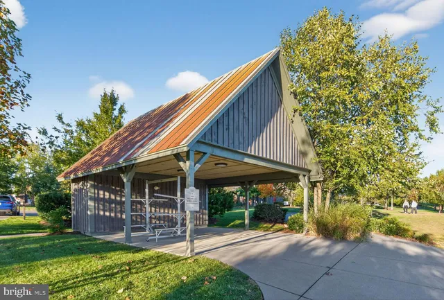 a view of a lake with a yard