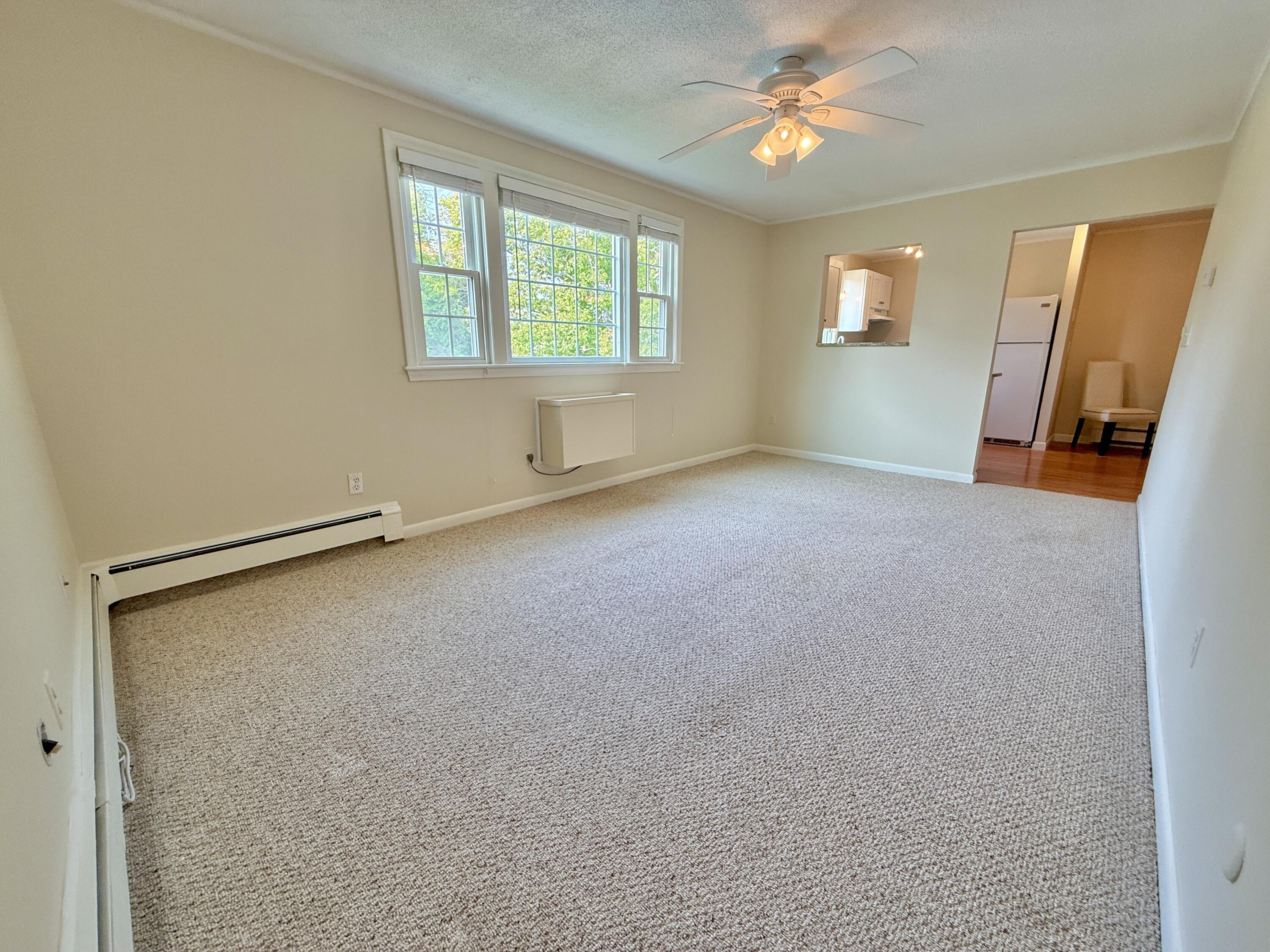 174 Upper County Road, Unit 215 Dennis Port, MA 02639 - Photo 12 of 33 Living Room