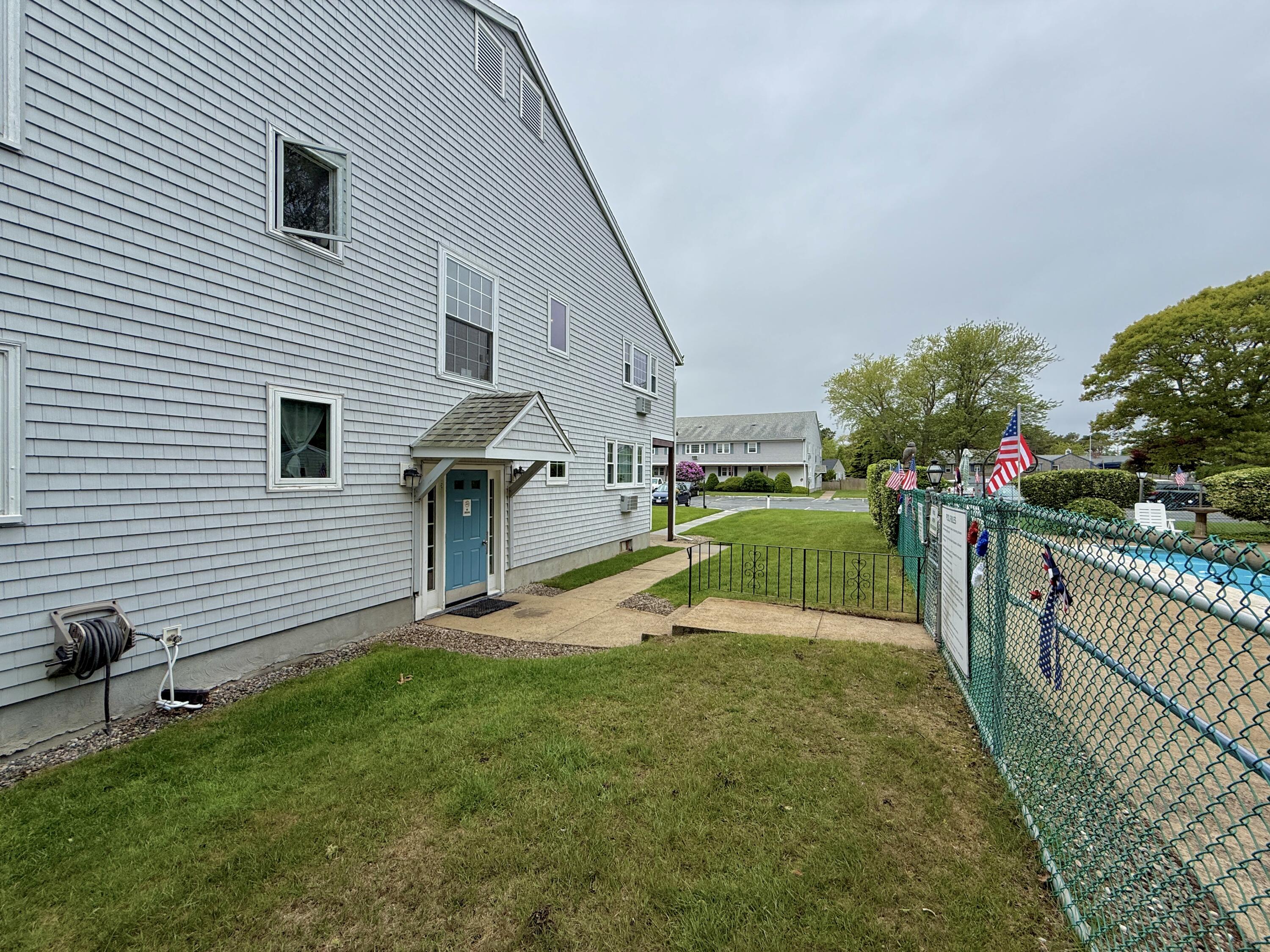 174 Upper County Road, Unit 215 Dennis Port, MA 02639 - Photo 4 of 33 Exterior Entrance