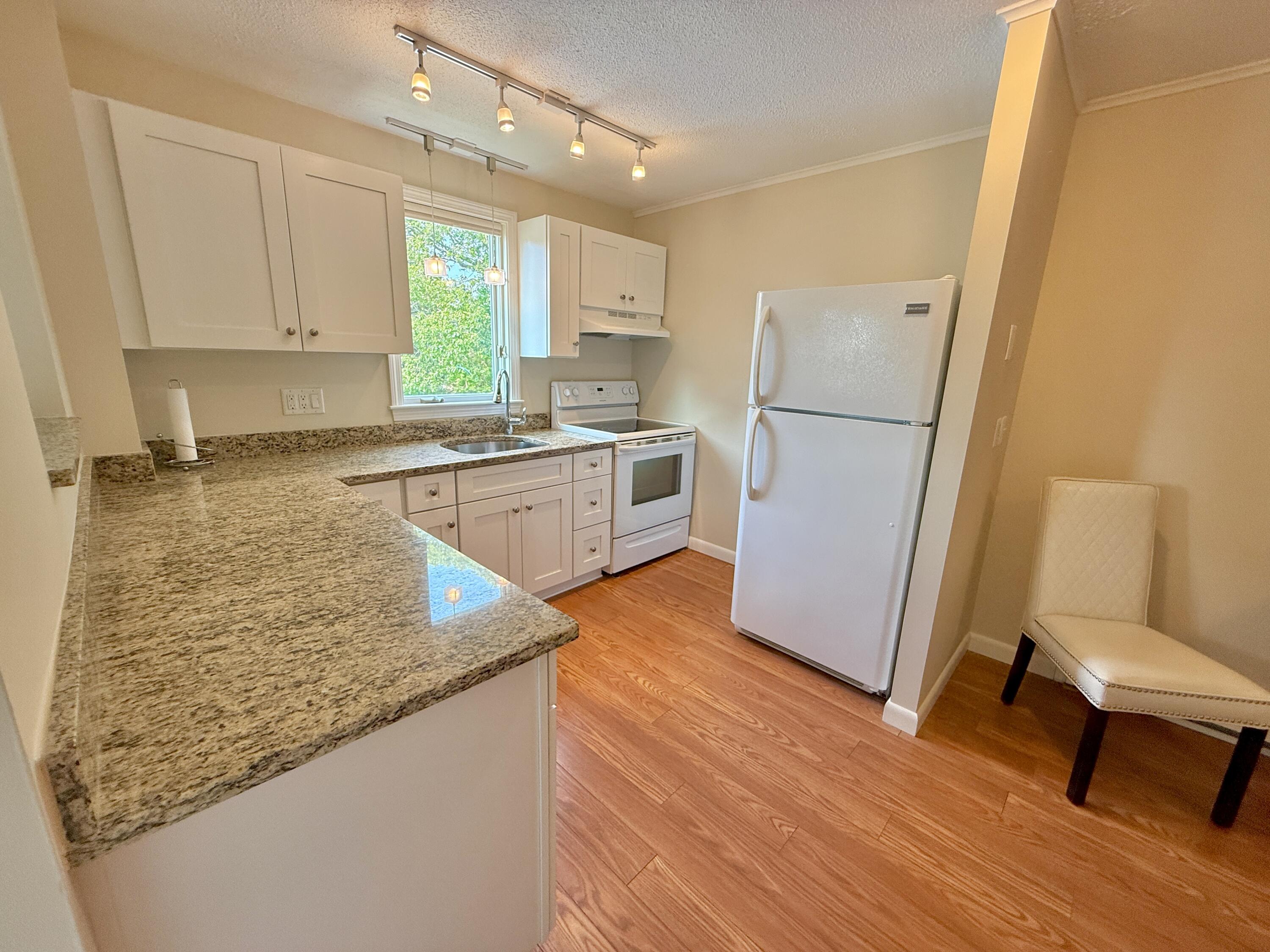 174 Upper County Road, Unit 215 Dennis Port, MA 02639 - Photo 9 of 33 Kitchen View