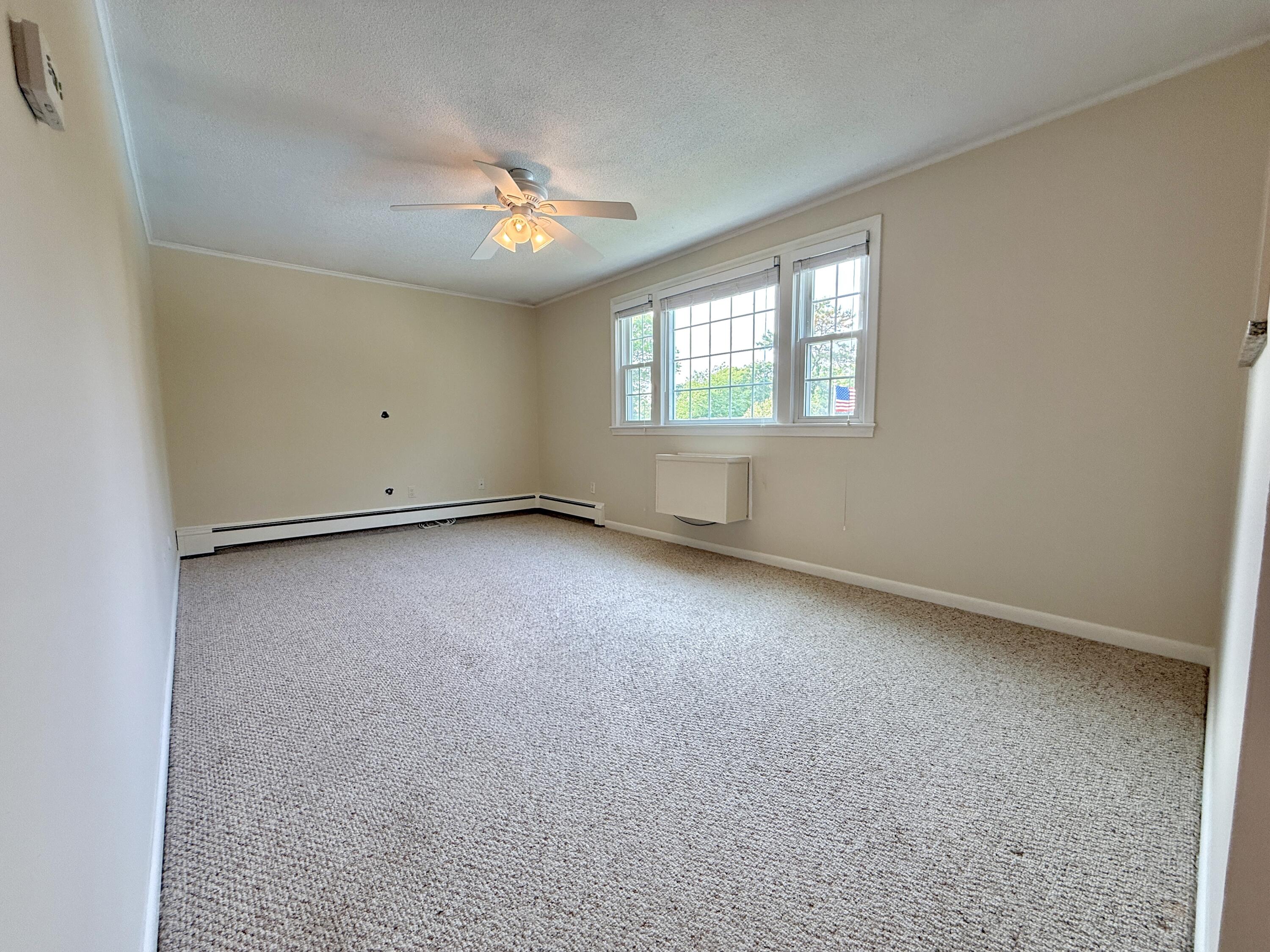 174 Upper County Road, Unit 215 Dennis Port, MA 02639 - Photo 10 of 33 LIving Room