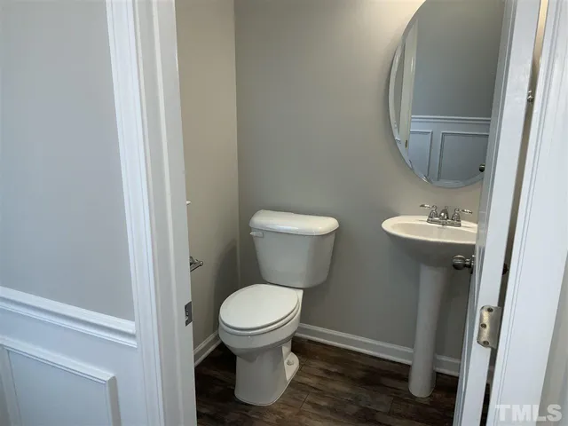 a bathroom with a toilet and a sink