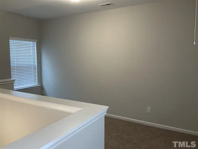 a close up of a white wall