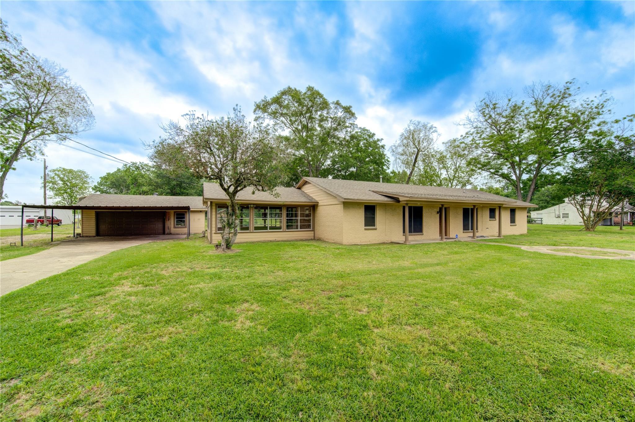 1745 Stone Road Pearland, TX 77581 - Photo 2 of 31 a front view of a house with garden