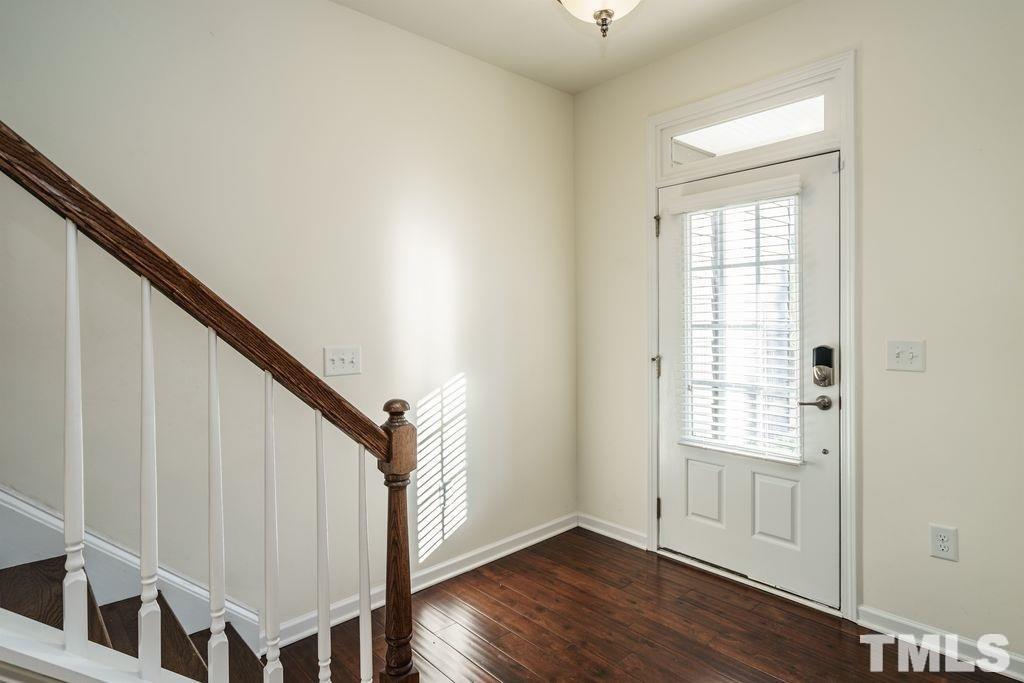 4956 Highcroft Drive Cary, NC 27519 - Photo 4 of 17 a view of an entryway with wooden floor