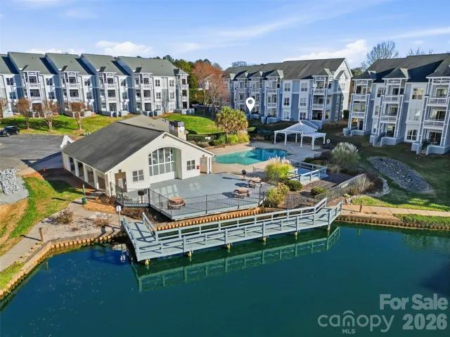 a aerial view of a house with a ocean view