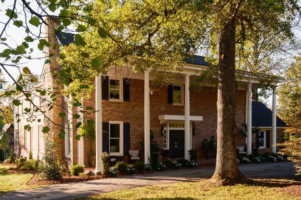5297 Old Harding Road Franklin, TN 37064 - Photo 2 of 100 a front view of a building with street view