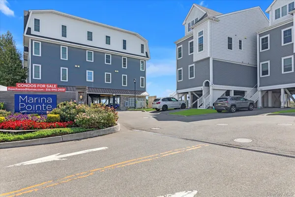 $599,999 | 214 Marina Pointe Drive, Unit 214, East Rockaway, NY 11518