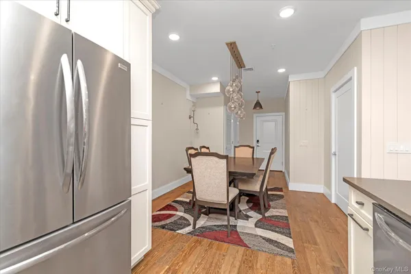 $599,999 | 214 Marina Pointe Drive, Unit 214, East Rockaway, NY 11518