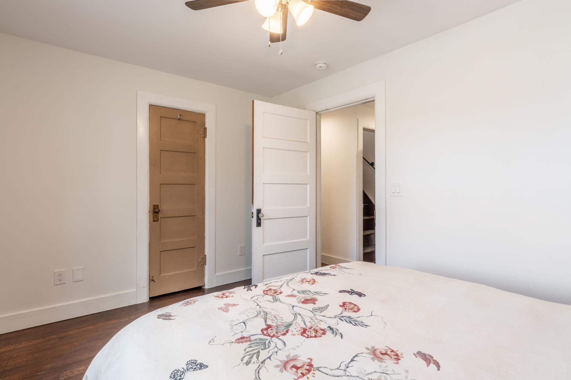 91 3rd Street Lee Vining, CA 93541 - Photo 16 of 44 a bedroom with a bed and a chandelier