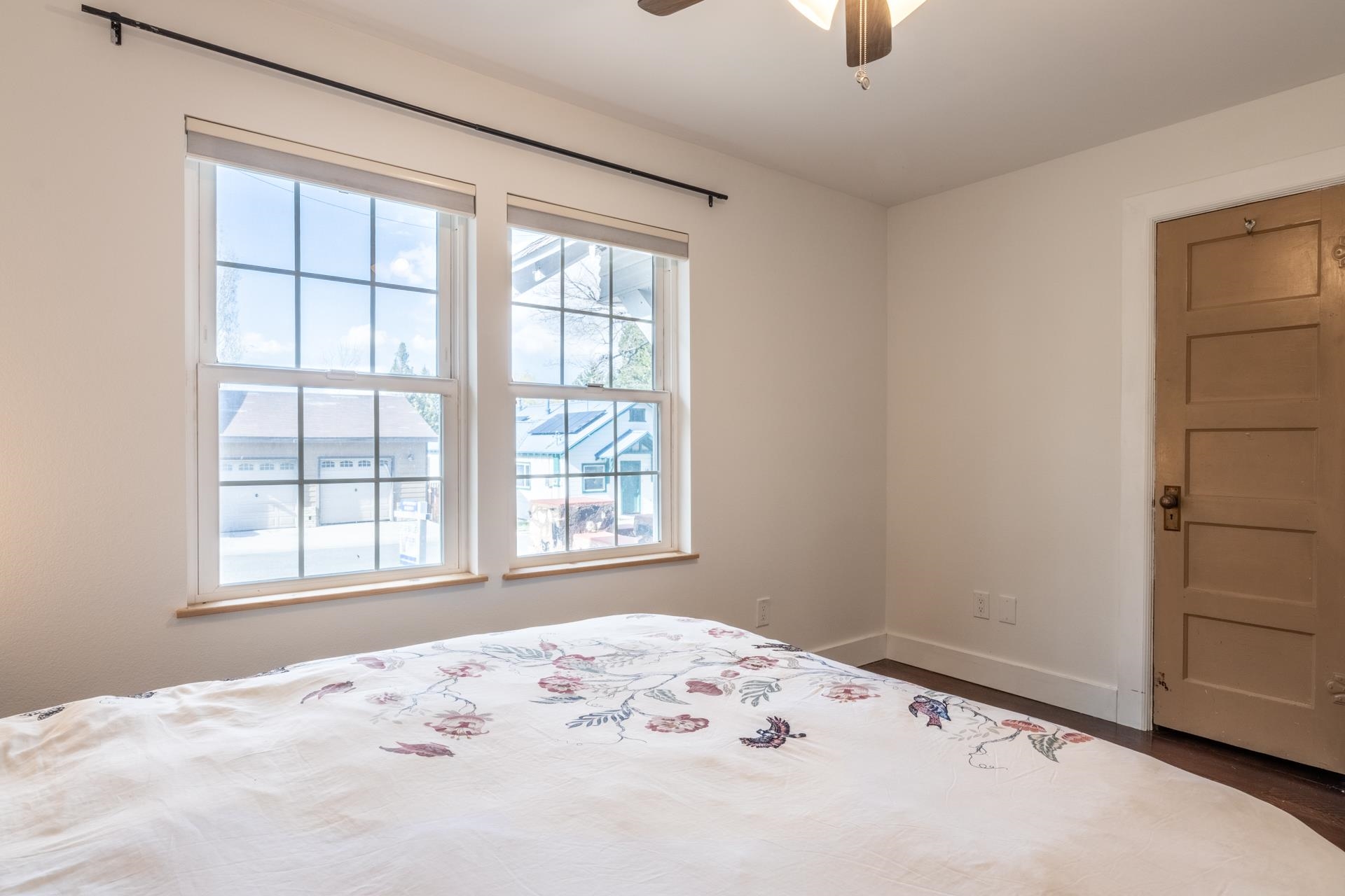 91 3rd Street Lee Vining, CA 93541 - Photo 18 of 44 a view of a bedroom with a bed and wooden floor