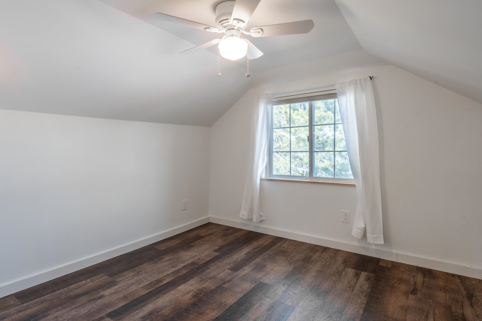 91 3rd Street Lee Vining, CA 93541 - Photo 26 of 44 wooden floor in an empty room with a window