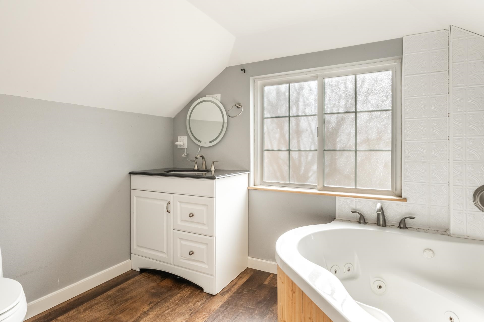 91 3rd Street Lee Vining, CA 93541 - Photo 29 of 44 a bathroom with a tub sink and window