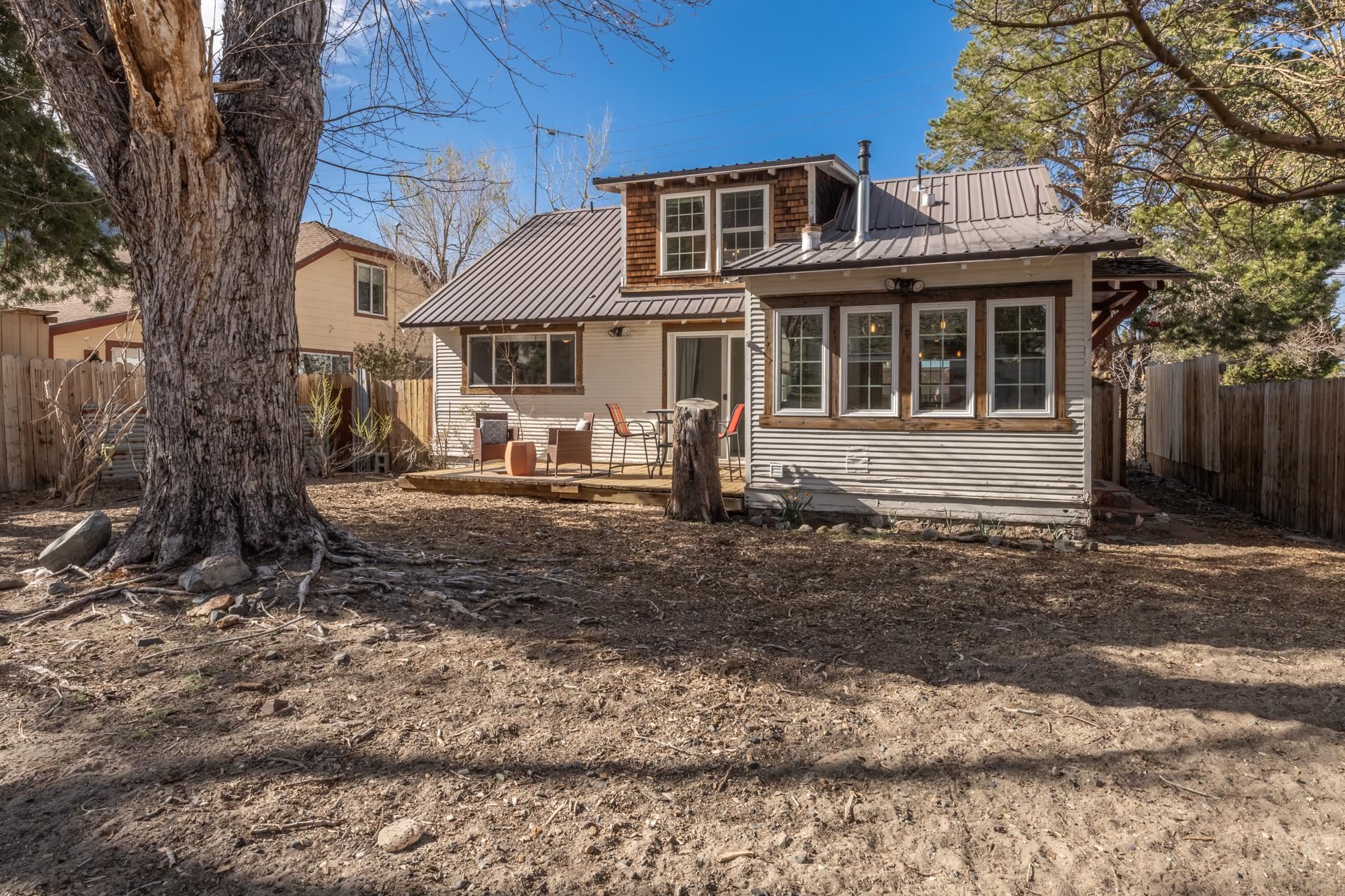 91 3rd Street Lee Vining, CA 93541 - Photo 38 of 44 a front view of a house with a yard
