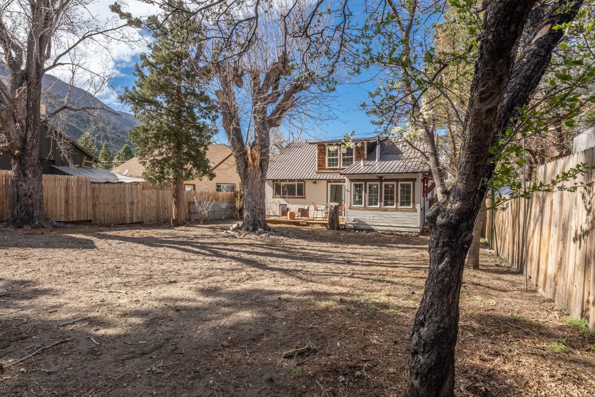 91 3rd Street Lee Vining, CA 93541 - Photo 39 of 44 a front view of a house with a yard