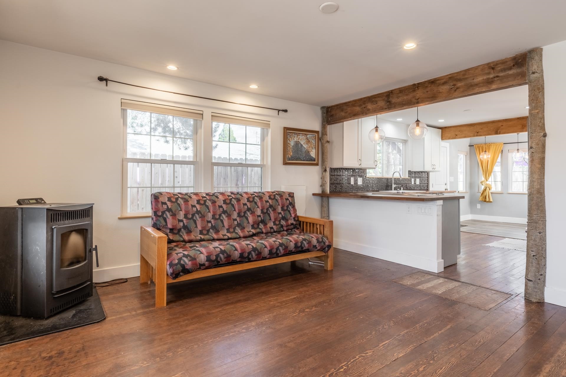 91 3rd Street Lee Vining, CA 93541 - Photo 6 of 44 a bedroom with a bed and a large window