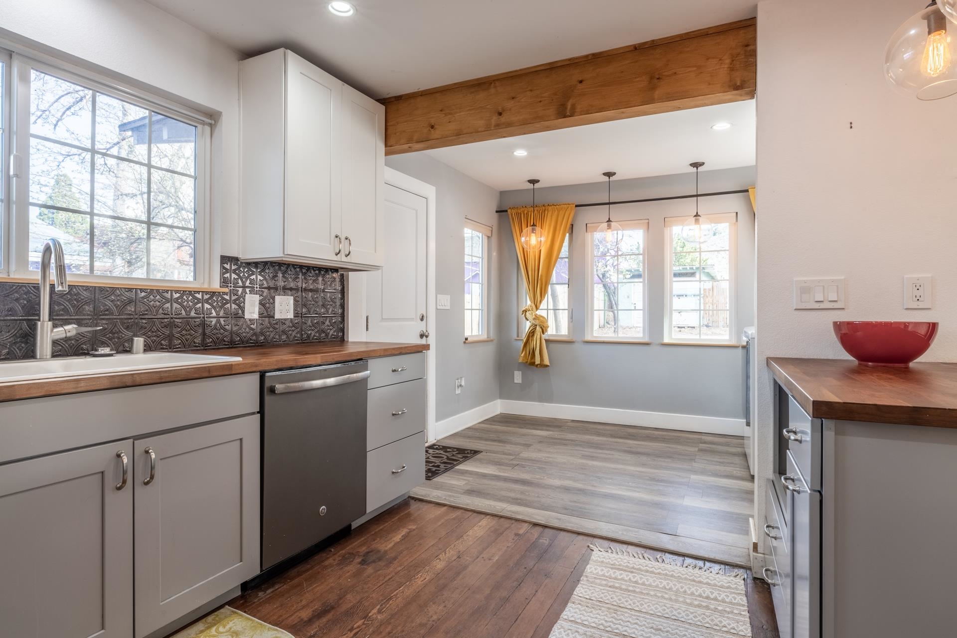 91 3rd Street Lee Vining, CA 93541 - Photo 9 of 44 a spacious bathroom with stainless steel appliances a sink cabinets and a window