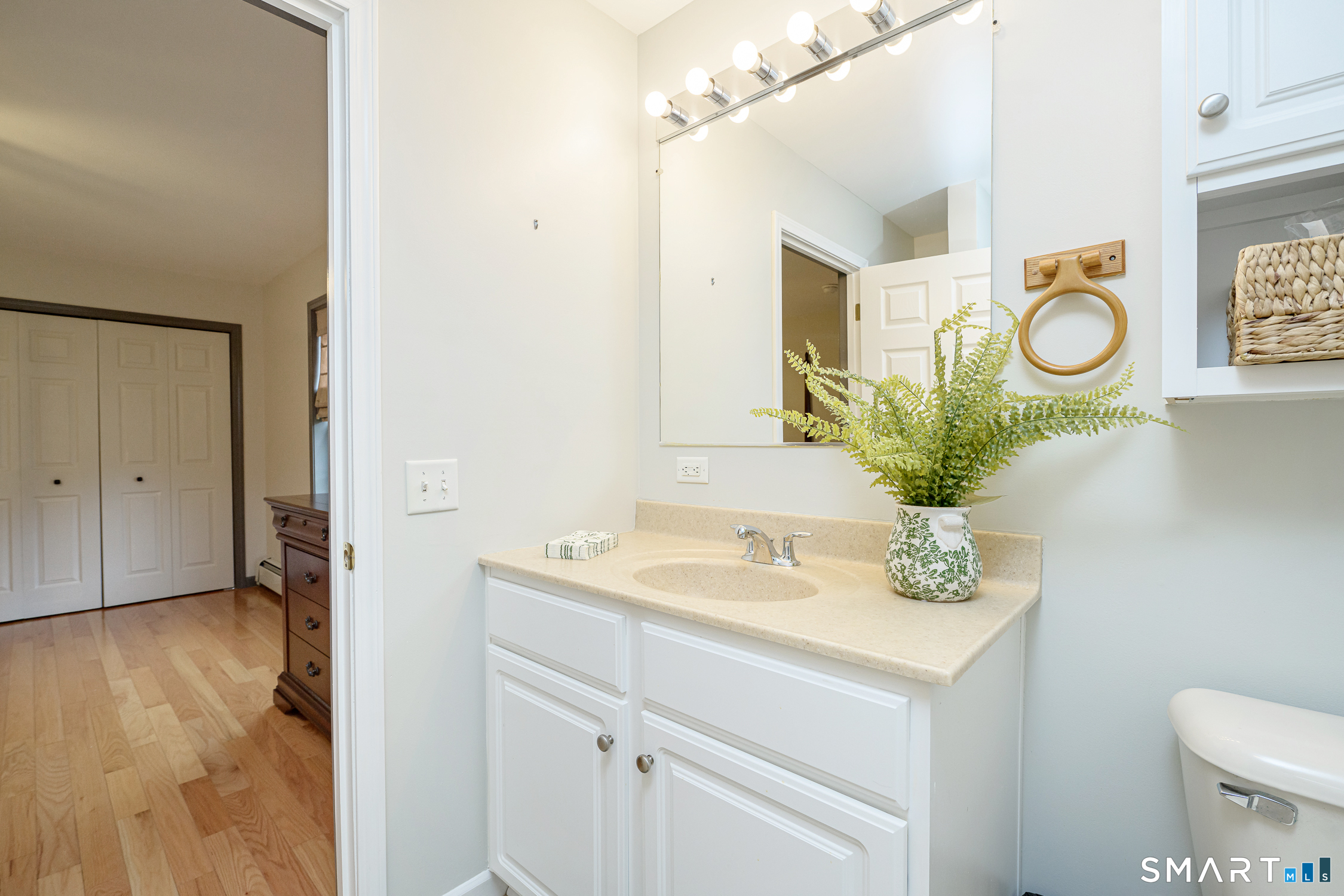 3 Oriole Drive, Unit 3 Killingly, CT 06239 - Photo 17 of 29 a bathroom with a sink and a mirror