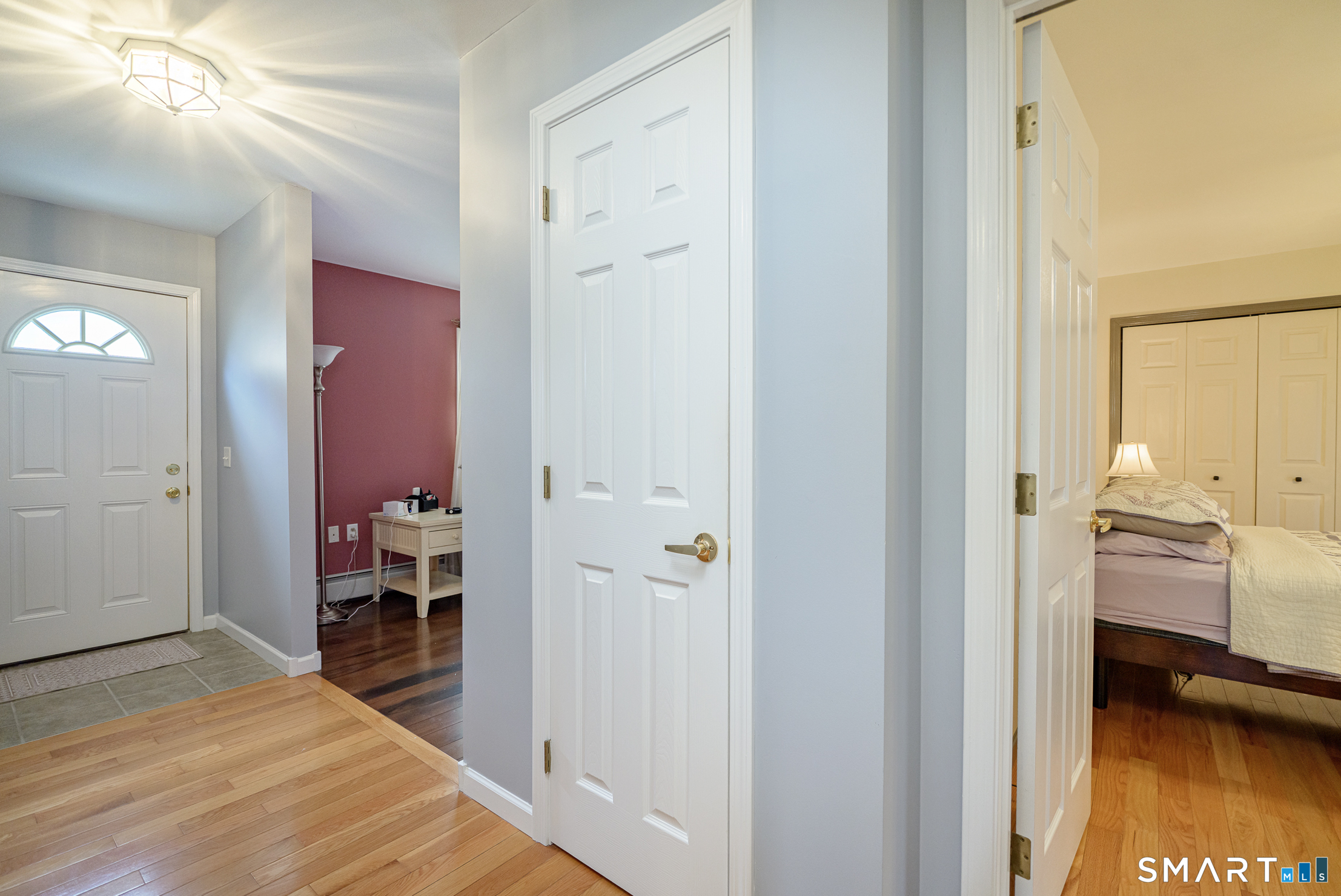 3 Oriole Drive, Unit 3 Killingly, CT 06239 - Photo 19 of 29 a bedroom with a bed and a view of bedroom