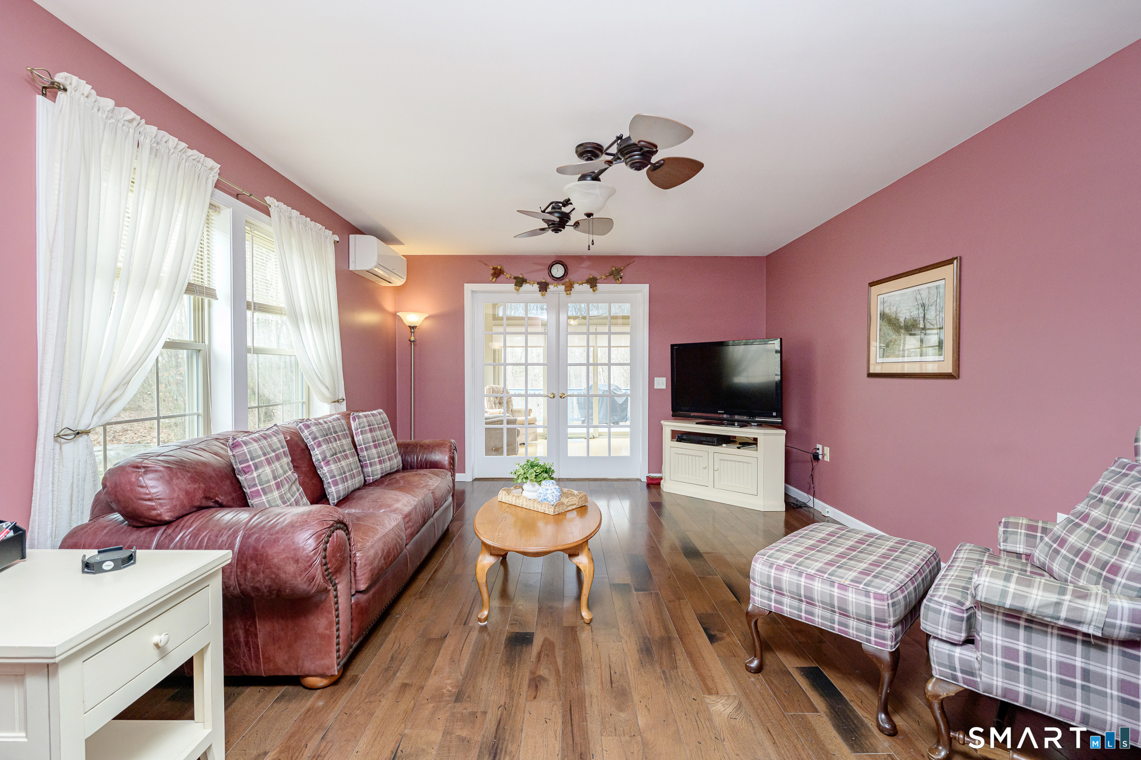 3 Oriole Drive, Unit 3 Killingly, CT 06239 - Photo 20 of 29 a living room with furniture and a flat screen tv