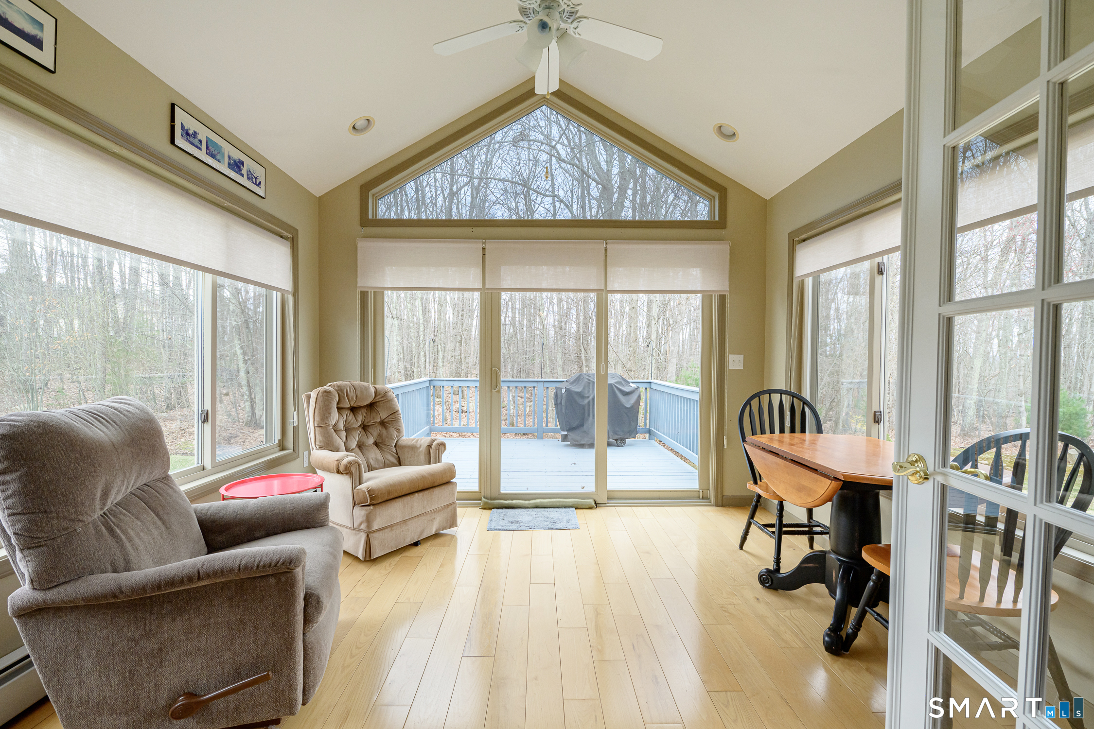 3 Oriole Drive, Unit 3 Killingly, CT 06239 - Photo 4 of 29 a living room with furniture and a large window