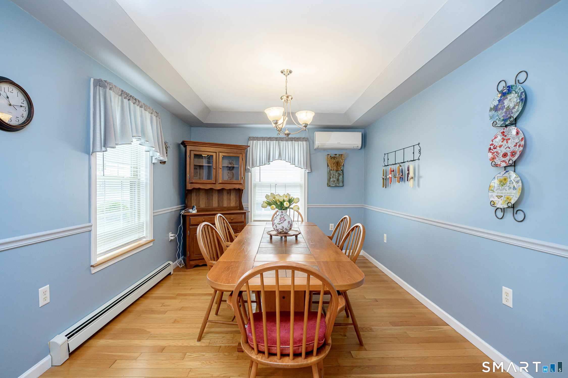 3 Oriole Drive, Unit 3 Killingly, CT 06239 - Photo 10 of 29 a view of a dining room with furniture window and wooden floor