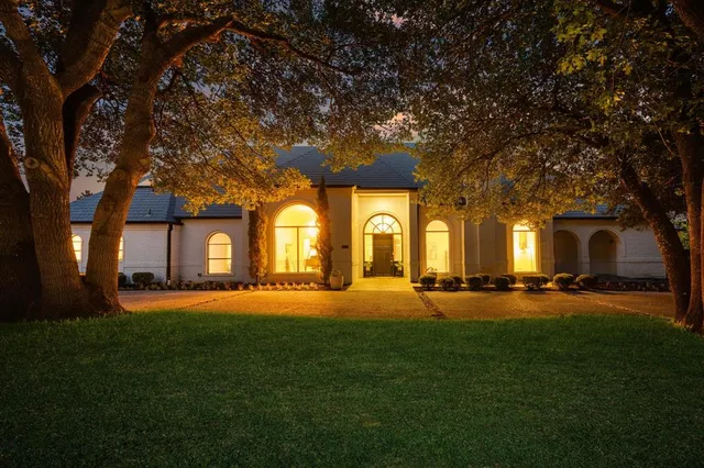 front view of a building with a big yard