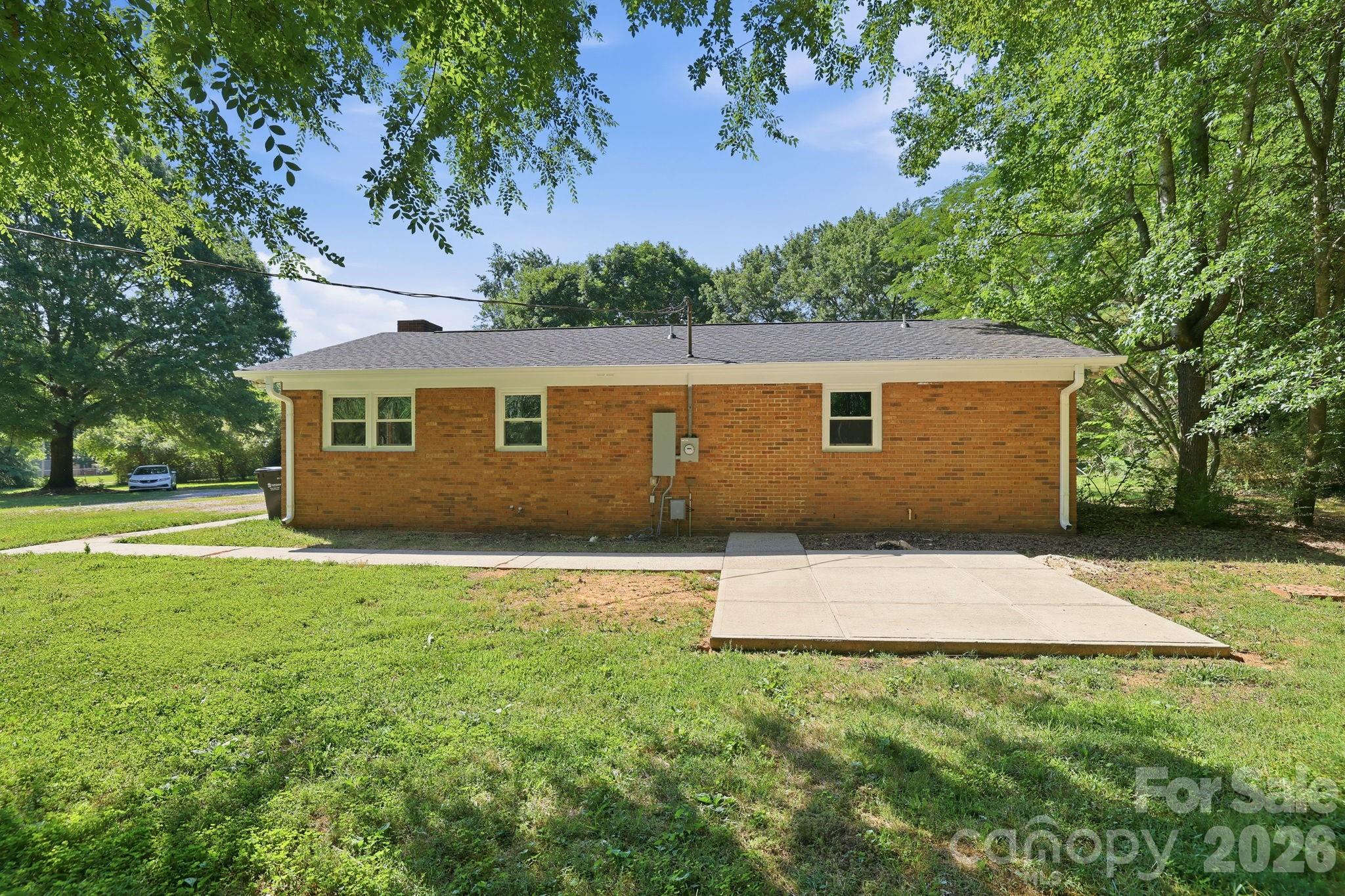 1108 Willoughby Road Monroe, NC 28110 - Photo 25 of 48 a view of a backyard of the house