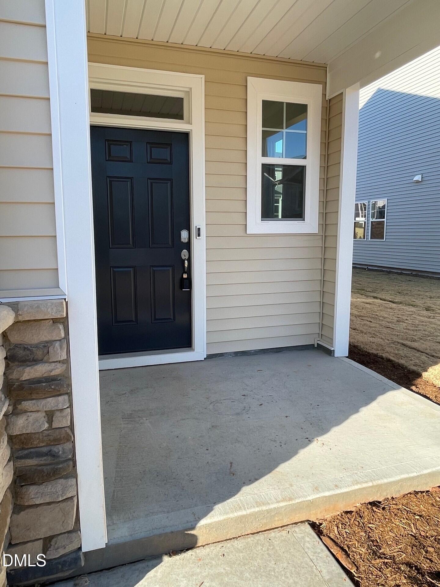 517 Hester Road Durham, NC 27703 - Photo 3 of 15 302 Covered fornt door