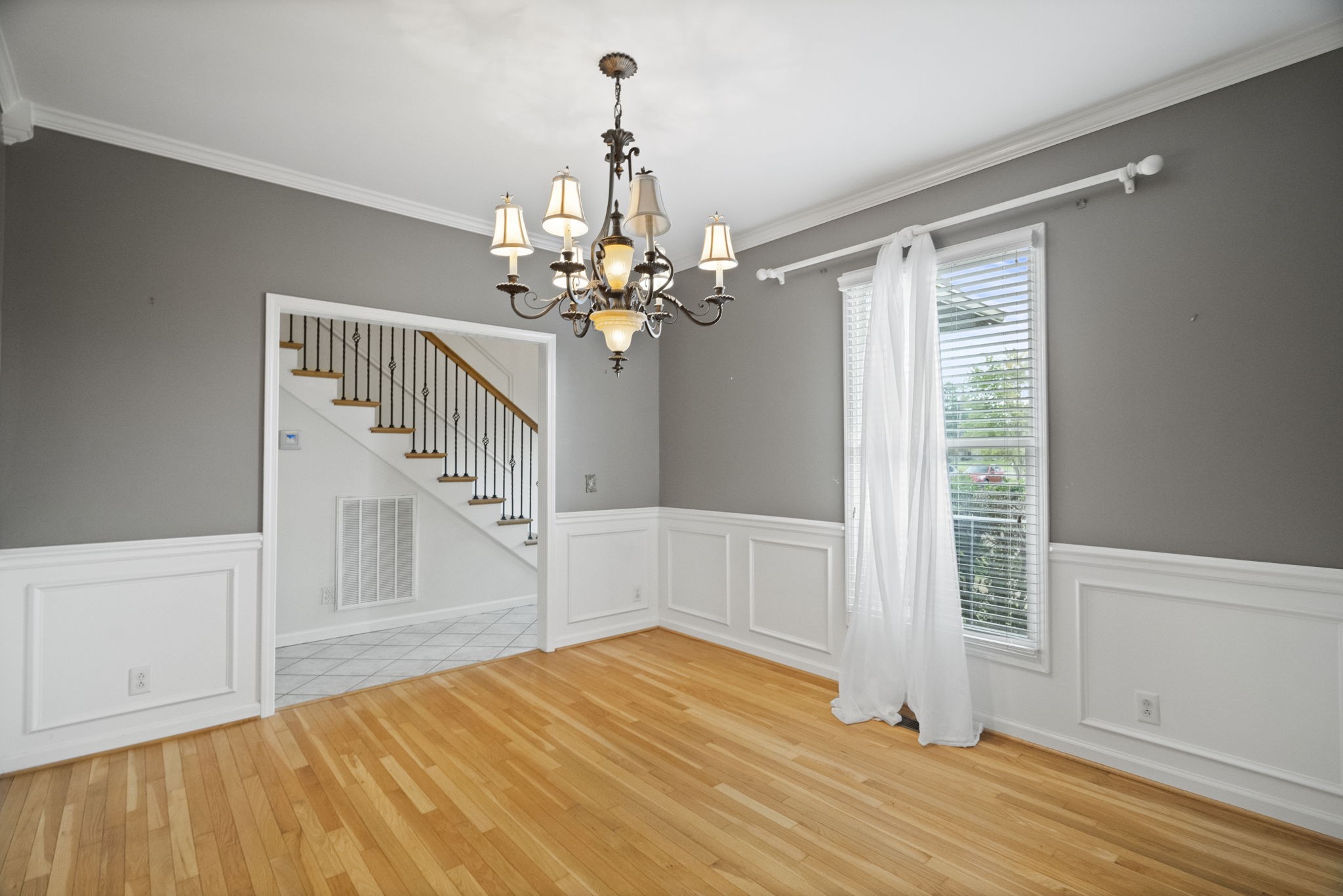 7144 Bidwell Road Joelton, TN 37080 - Photo 16 of 60 a view of a livingroom with wooden floor and staircase