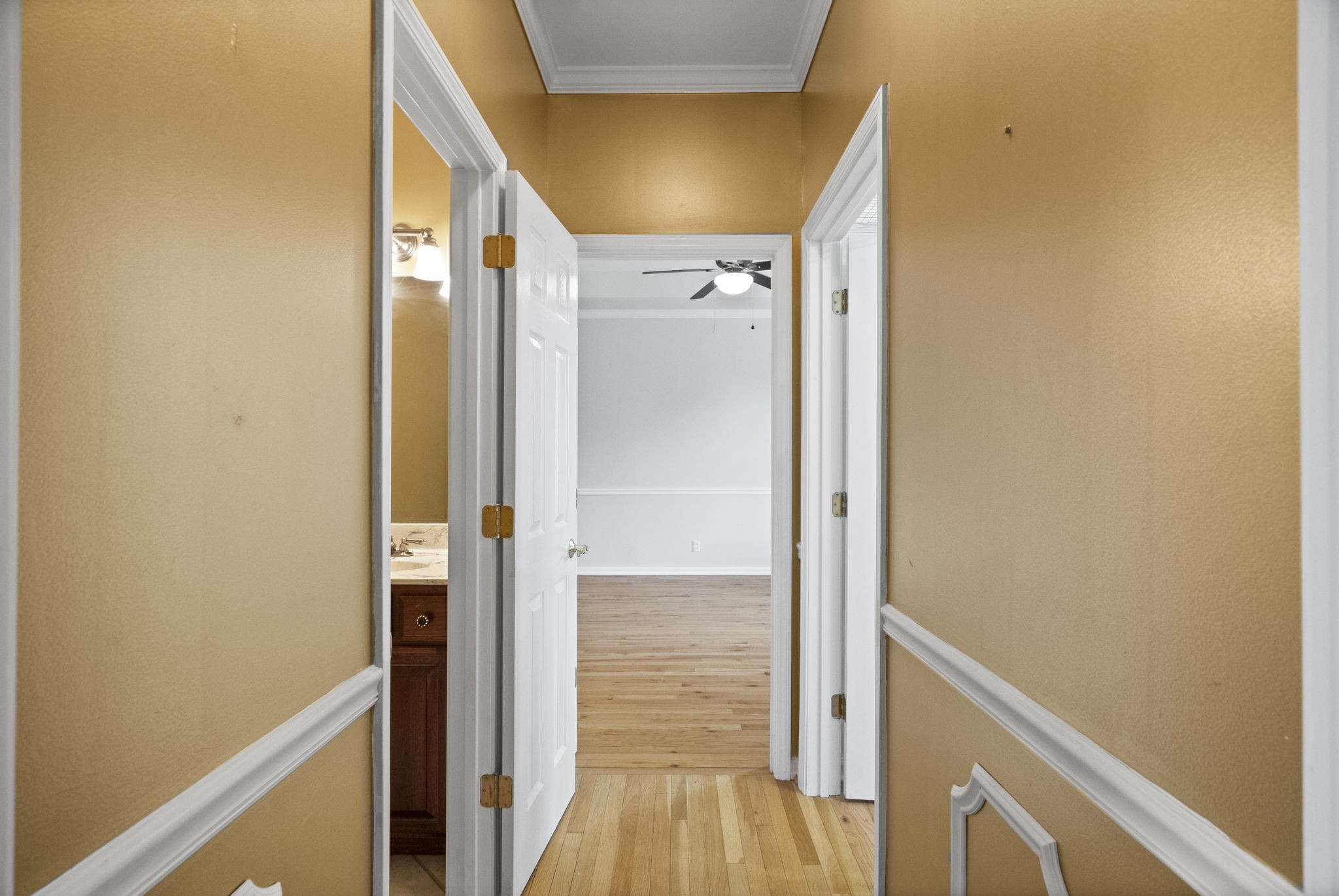 7144 Bidwell Road Joelton, TN 37080 - Photo 17 of 60 a view of a hallway with wooden floor and staircase