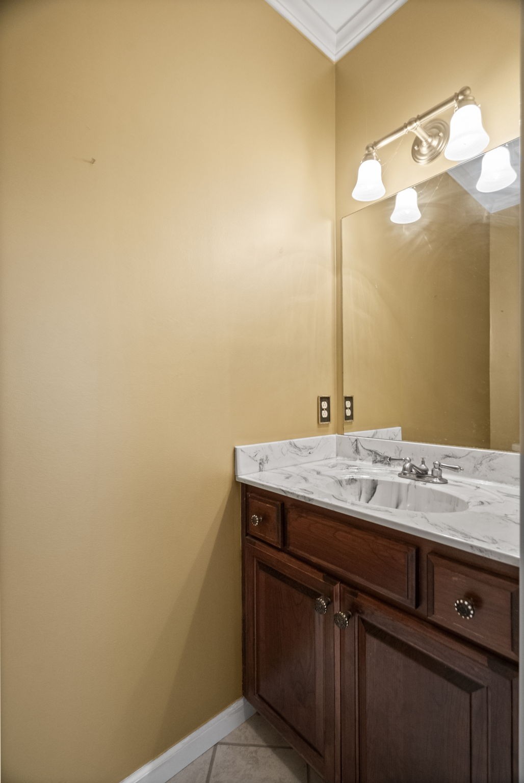 7144 Bidwell Road Joelton, TN 37080 - Photo 18 of 60 a bathroom with a sink and a mirror