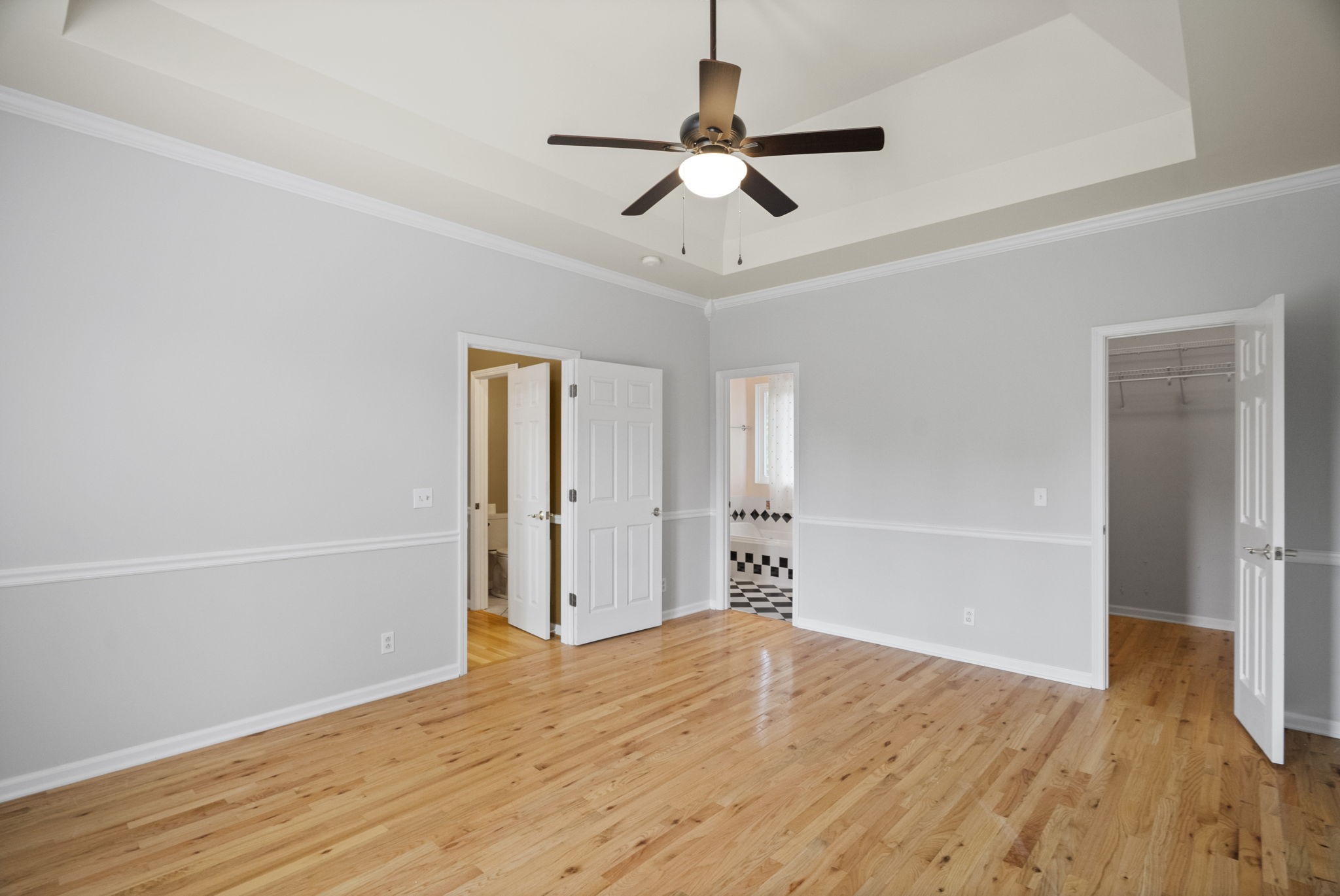 7144 Bidwell Road Joelton, TN 37080 - Photo 21 of 60 a bedroom with a bed and wooden floor