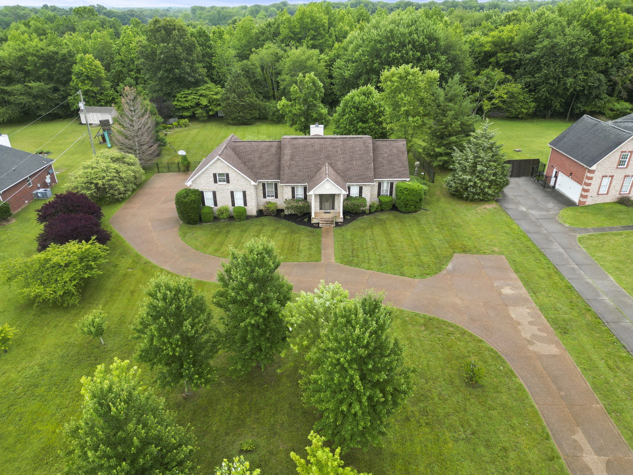 7144 Bidwell Road Joelton, TN 37080 - Photo 3 of 60 an aerial view of a house with swimming pool a yard and a yard