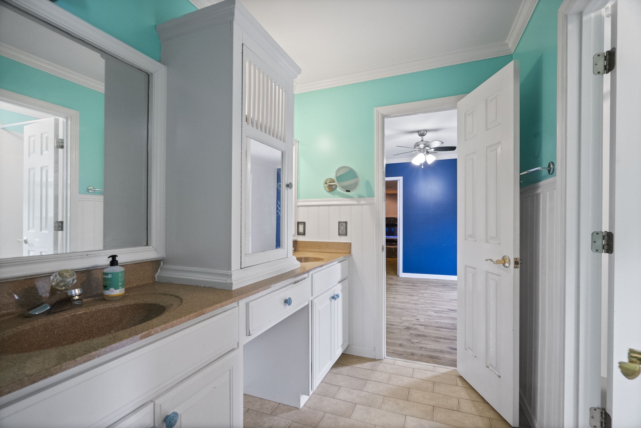 7144 Bidwell Road Joelton, TN 37080 - Photo 40 of 60 a bathroom with a sink and two mirror