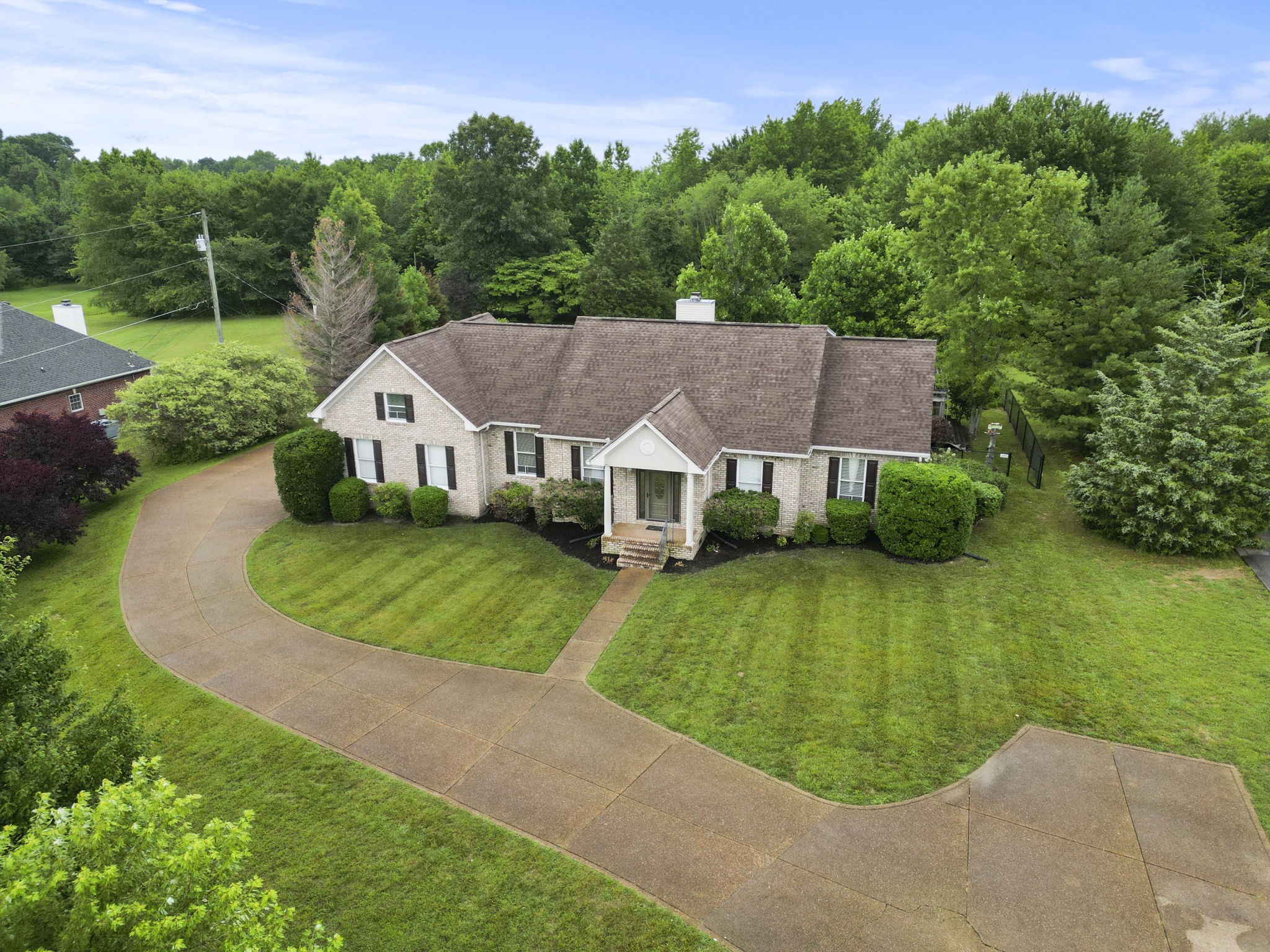 7144 Bidwell Road Joelton, TN 37080 - Photo 4 of 60 an aerial view of a house