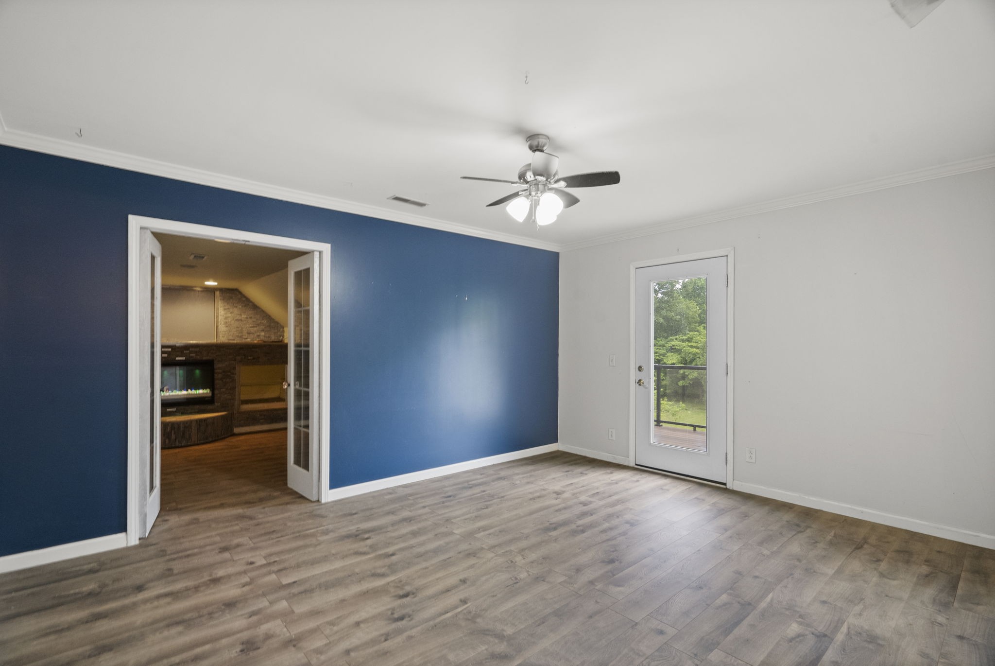 7144 Bidwell Road Joelton, TN 37080 - Photo 43 of 60 wooden floor in an empty room with a window