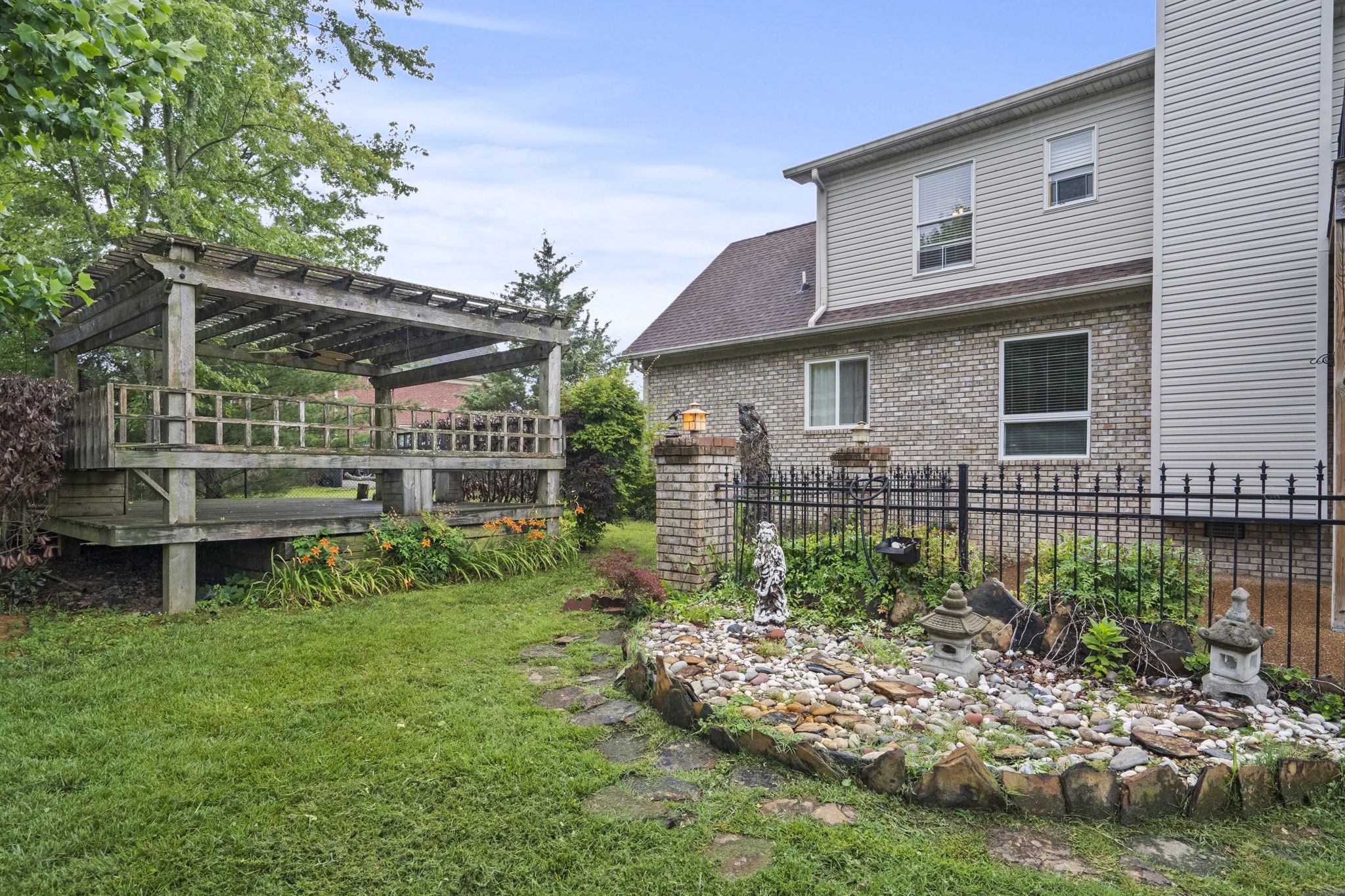 7144 Bidwell Road Joelton, TN 37080 - Photo 55 of 60 a view of house with a yard and sitting area