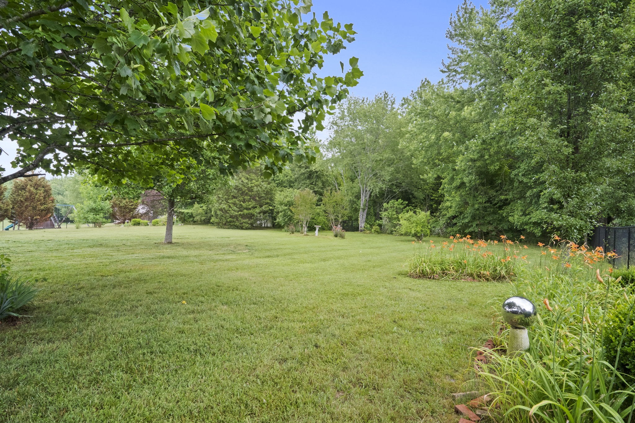 7144 Bidwell Road Joelton, TN 37080 - Photo 57 of 60 a huge green field with lots of bushes