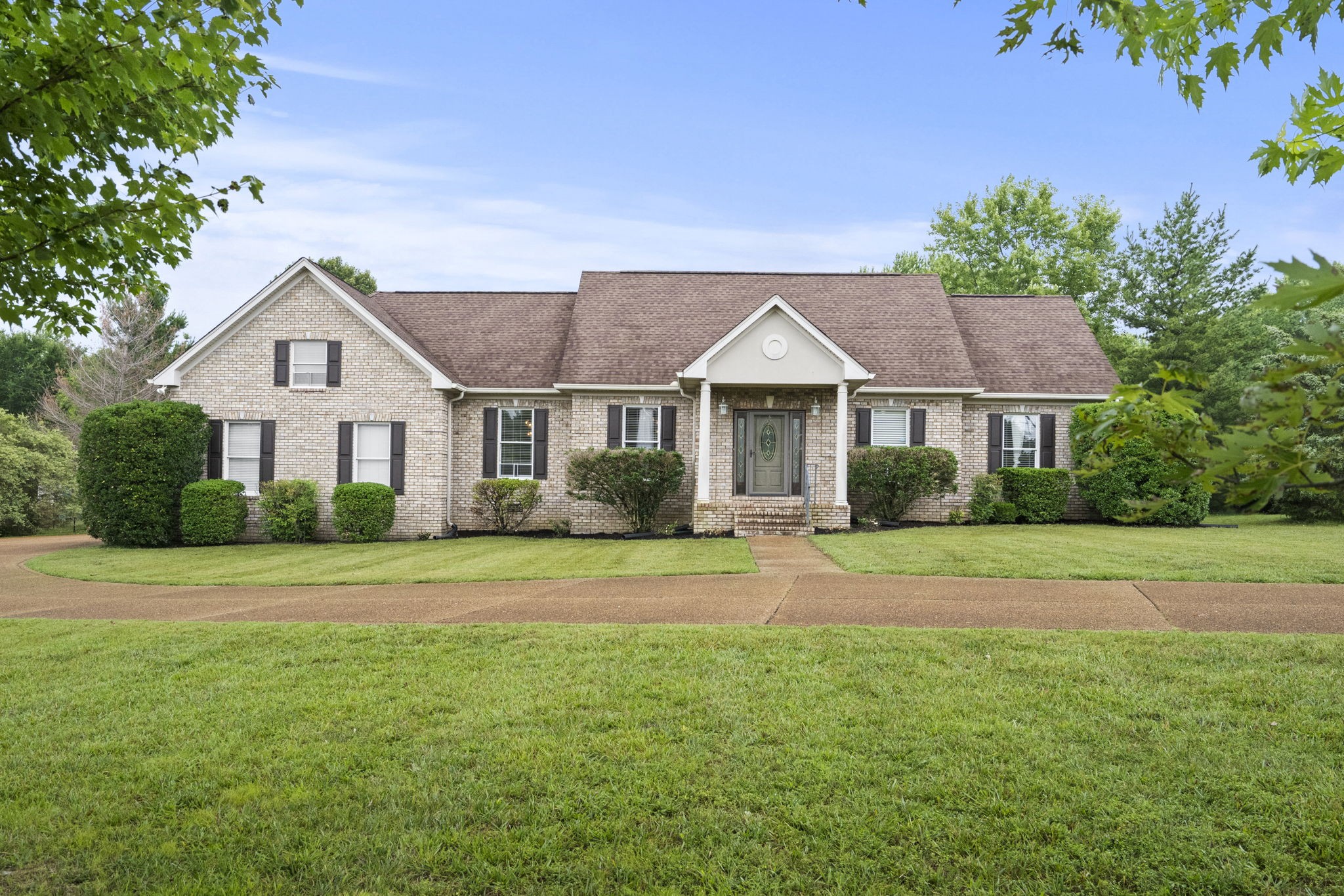 7144 Bidwell Road Joelton, TN 37080 - Photo 6 of 60 a front view of a house with a yard