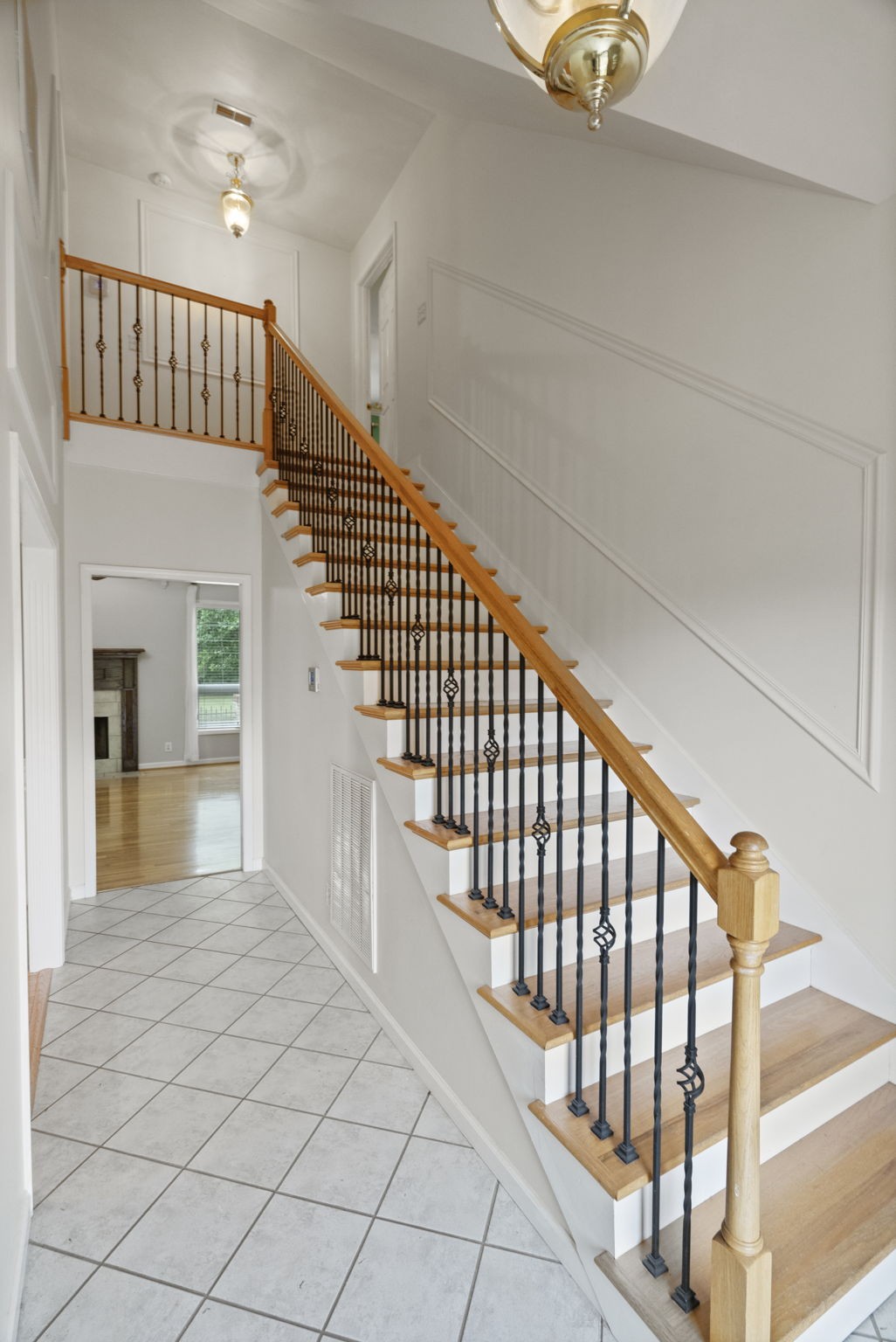 7144 Bidwell Road Joelton, TN 37080 - Photo 9 of 60 a view of staircase with railing and white walls