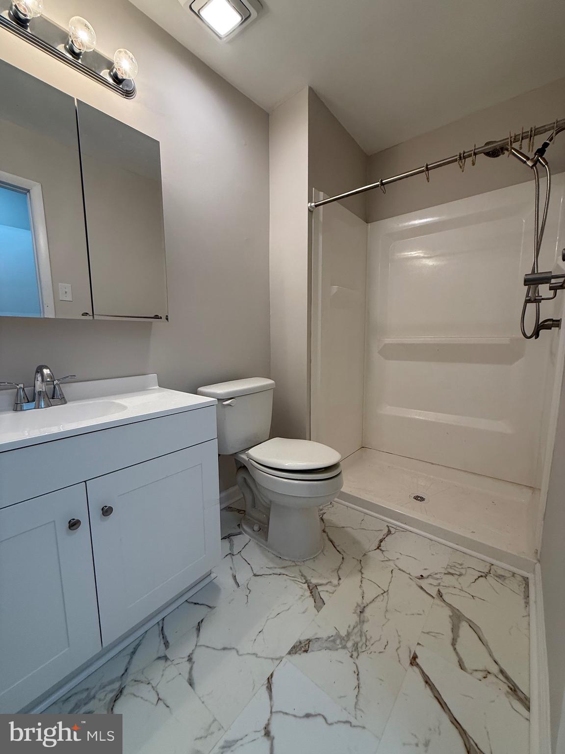 162 Willow Turn, Unit B Mount Laurel, NJ 08054 - Photo 11 of 12 a bathroom with a sink toilet and shower