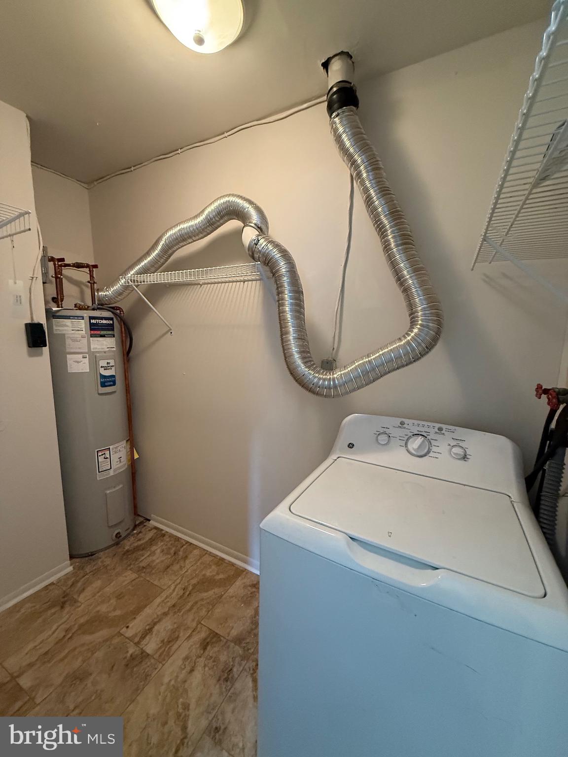 162 Willow Turn, Unit B Mount Laurel, NJ 08054 - Photo 12 of 12 a utility room with dryer and washer