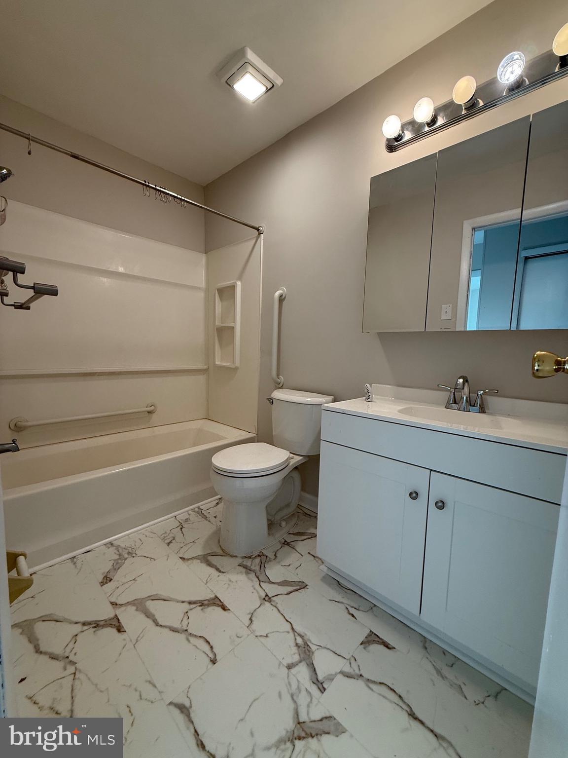 162 Willow Turn, Unit B Mount Laurel, NJ 08054 - Photo 7 of 12 a bathroom with a sink toilet and shower